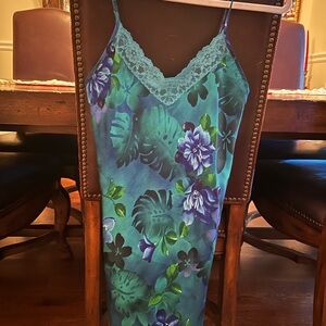 Beautiful slip Tag removed Knee length Lace on neckline and hem